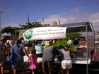 Visitors sign up for free prizes at the Kaimuki Business & Professional Association