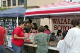 A Waialae School representative answers inquiries