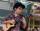 A young ukulele player entertains audiences at Celebrate Kaimuki