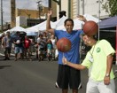 And he's spinning the ball as crowds look on! (Celebrate Kaimuki Kanikapila 2011)