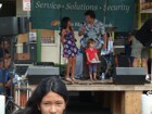 Host interviews the young crowd during Celebrate Kaimuki 2011