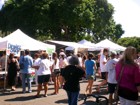 Hungry Kaimuki shoppers and guests check out the food booths at the craft fair