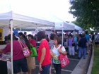 Shoppers look for great deals at the Diamond Head Arts & Crafts Fair in Kaimuki