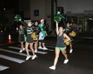 Cheering for the Kaimuki High School float during the parade
