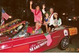Bill Green, owner of Kahala Shell driver, with passenger Representative Barbara Marumoto and grandchildren