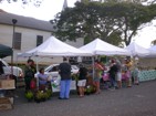 Crowds check out the interesting products at the Tuesday night KCC Farmers Market