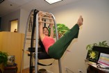 Showcasing impressive flexibility at Pilates Advantage