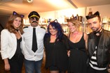 People dressed up in costume for Black Cat Salon