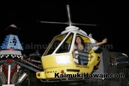 Mom and keiki enjoying the Helicopters at the 2016 Kaimuki Carnival