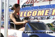Speeding by on a fun ride at Kaimuki Carnival