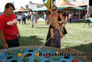 Fishing for cool prizes at the Kaimuki Carnival at Kaimuki High School