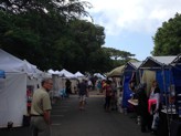 Vendors set up their booths at the Kapiolani Community College parking lot