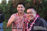 Shaka! Jeff Lau (left) and Todd Mayeshiro (right) celebrate with the Kaimuki community during the Christmas Tree lighting
